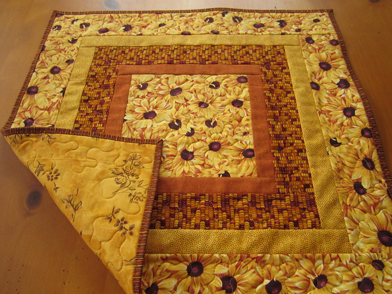 Golden Sunflower Glow Quilted Table Topper NCU0NTD430